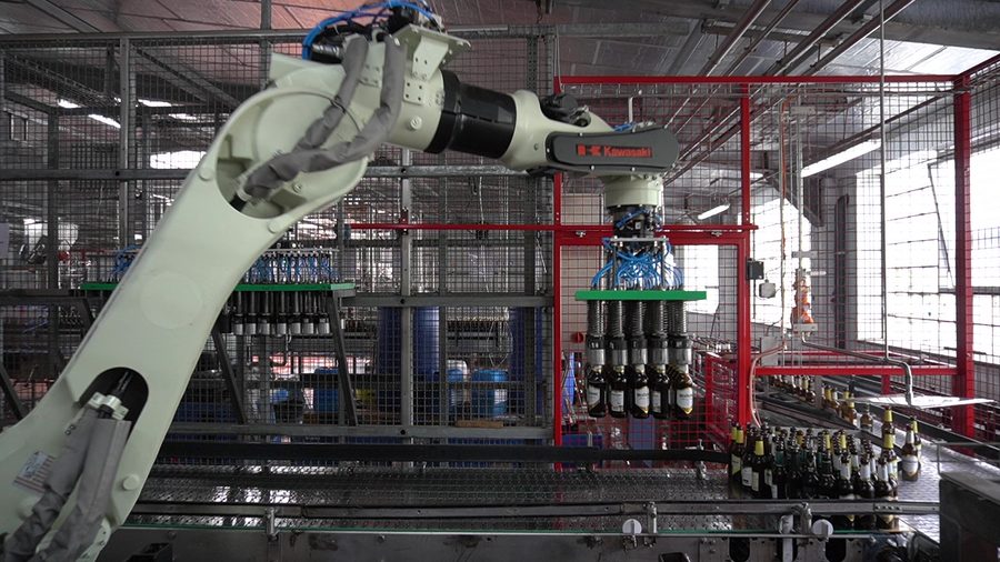 Kawasaki BX robot handles glass bottles